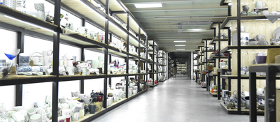 Tableware showroom featuring porcelain stoneware mugs and dinnerware collections